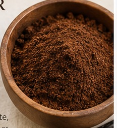 Fine Ugandan vanilla bean powder, Grade AA, in a wooden bowl